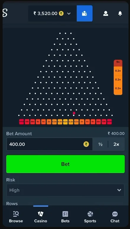 Mobile Plinko layout with high risk selected and the ball landing in low multipliers.